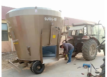 Vertical tractor tmixer